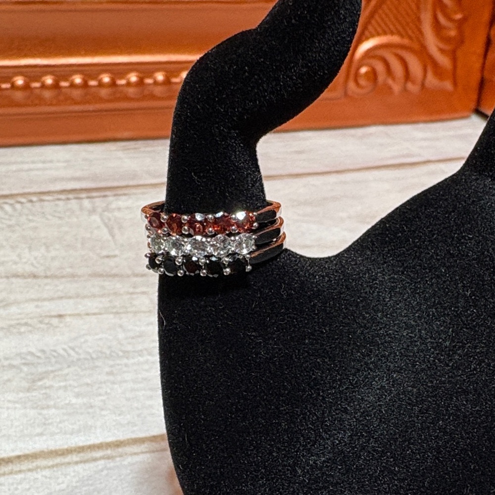 JTV Black, Silver, and Red Stacked Rings